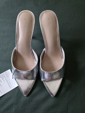 The Drop Metallic Silver Pointed Mule Heels
